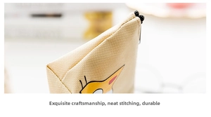 Macro shot of durable canvas stitching and black zipper on a cat coin purse