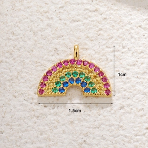 Detailed view of rainbow zircon horseshoe pendant with 1.5cm width and 1cm height