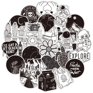 Detailed view of black and white VSCO stickers featuring astronauts and nature art