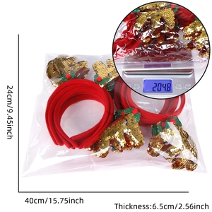 Detail showing weight and dimensions of Christmas reindeer antler headbands in packaging