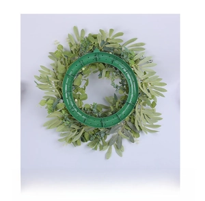 Detailed back view of the artificial eucalyptus wreath showing the green plastic frame support