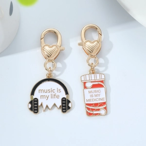 Fashion headphone and medicine bottle keychain pendants with music quote engravings