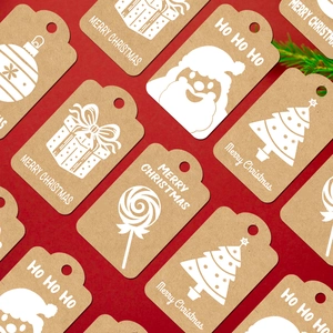 Christmas kraft paper gift tags set with twine and white holiday patterns on red background