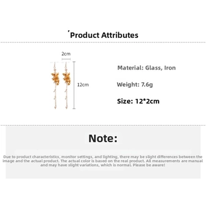 Detailed specs for gold floral tassel earrings with glass beads, measuring 12x2cm and 7.6g
