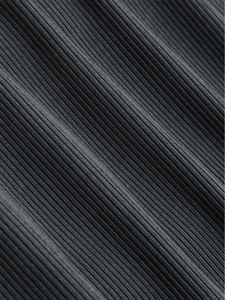 Macro shot of charcoal black ribbed knit fabric showing fine pleats and texture details