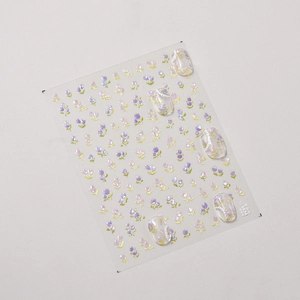 Detail of 3D shell-shine tulip nail stickers with pearl finish and floral relief