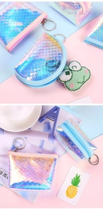 Detailed macro of holographic laser fish scale texture and metal zipper on mini coin purse