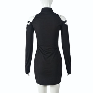 Detail showing back view of black ribbed knit dress with shoulder eyelet accents