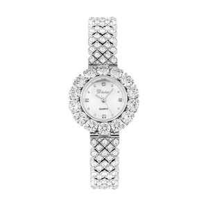 Luxury women's silver quartz watch with shimmering rhinestone bezel and steel strap