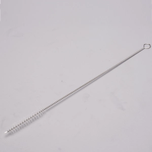 Close-up of slender metal cleaning brush with white nylon bristles for straws