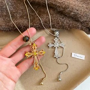 Vintage cross pendant necklace with rhinestones and natural stones in gold and silver