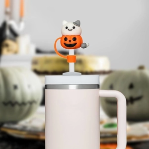 Halloween silicone straw cover featuring a white cat in an orange pumpkin decoration