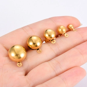 Golden stainless steel earring base components in five sizes shown on a hand