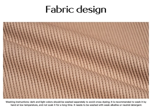 Detailed macro view of brown ribbed knit fabric texture with English washing instructions