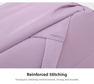 Macro shot of triangular reinforced stitching on purple nylon backpack for durability