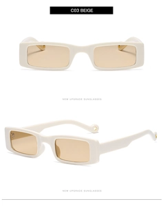 Close-up of retro square beige sunglasses with tinted lenses and high-quality frame