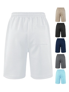 Detail showing waffle texture fabric and color options of men's drawstring casual shorts
