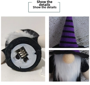 Detail view of the Halloween gnome plush showing the battery compartment and knit textures