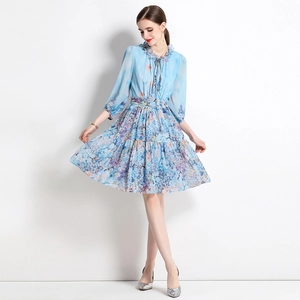 Elegant light blue floral chiffon dress with puff sleeves and ruffled neckline
