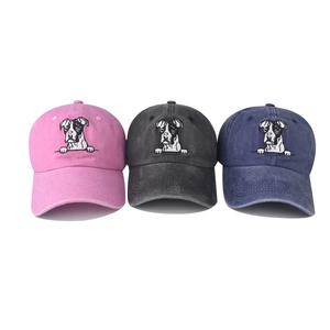 Classic washed cotton baseball caps with embroidered dog face designs in three colors