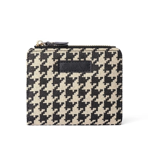 Mini women's zipper coin purse with black and white houndstooth pattern and leather trim