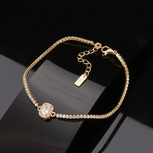 Elegant gold S925 silver tennis bracelet featuring rectangle cubic zirconia on black mirror