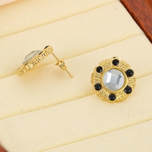 Boucles d'oreilles vintage en acier doré 18K avec cristaux et pierres noires rondes