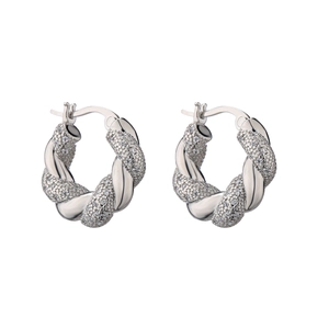 Silver twisted hoop earrings with pavé zircons and polished metallic texture