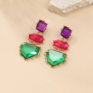 Bohemian colorful gemstone drop earrings with purple magenta and green stones in gold