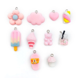Collection of 10 pink resin charms including clouds flowers and ice cream for DIY crafts