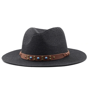 Detail of black straw fedora with leather band, bronze studs and turquoise bead accents
