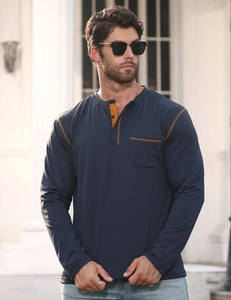 Detail of navy Henley shirt with orange contrast placket and functional chest pocket