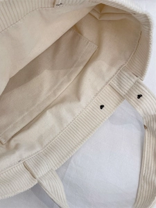 Corduroy bear tote bag in beige with interior pocket and heart embroidery detail