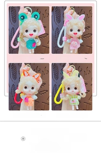 Macro detail of four cute cartoon dolls with knit lace outfits and golden keyrings