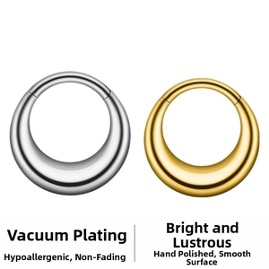 Close-up of polished silver and gold chunky hoop earrings with vacuum plating details