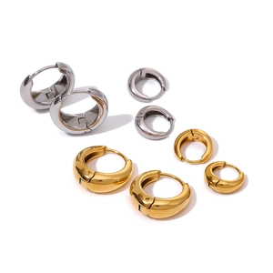 Polished 18k gold and silver chunky hoop earrings in two sizes with sleek curved design
