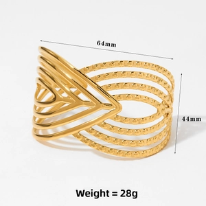 Detailed view of hollow gold cuff bracelet showing 64mm diameter and 44mm width
