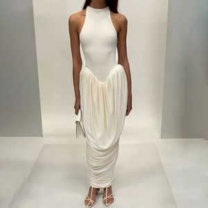 Detail of the elegant ruched drape design on white sleeveless bodycon maxi dress