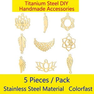 5pcs set of gold stainless steel charms with lotus, feathers, and wings for DIY jewelry