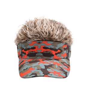 Front view of camouflage visor cap with synthetic brown curly wig hair decoration
