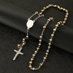Two-tone stainless steel rosary necklace with Saint Benedict medal and silver cross pendant