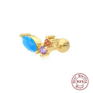 Detail of S925 sterling silver piercing stud with blue marquise and orange gems