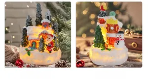 Illuminated Christmas resin house ornaments with Santa and snowman in a festive setting