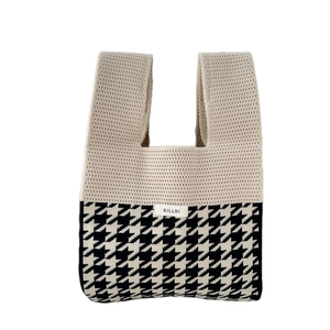 Chic houndstooth pattern knit tote bag in beige and black with integrated handle