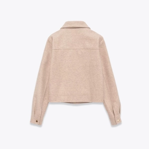 Women's casual soft oatmeal beige zip jacket with lapel collar shown from back view