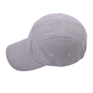 Detail view of grey five-panel camper cap showing side breathable eyelets and cotton fabric