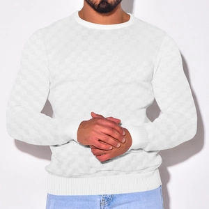 Detailed view of white men's knit sweater with heavy jacquard checkered texture