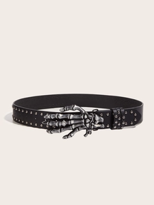 Detail of black punk leather belt with silver skull hand buckle and metal rivets
