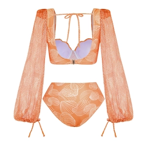 Detail of orange bikini with shell print, mesh long sleeves and underwire support