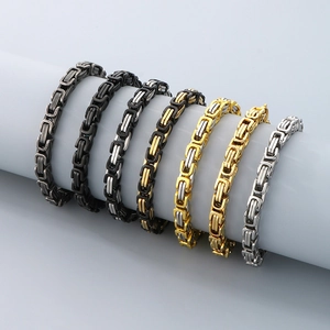 Byzantine chain bracelets in assorted metallic finishes on a display cylinder